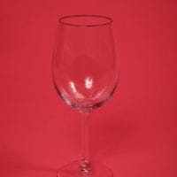 Tall longwood wine glass with red background